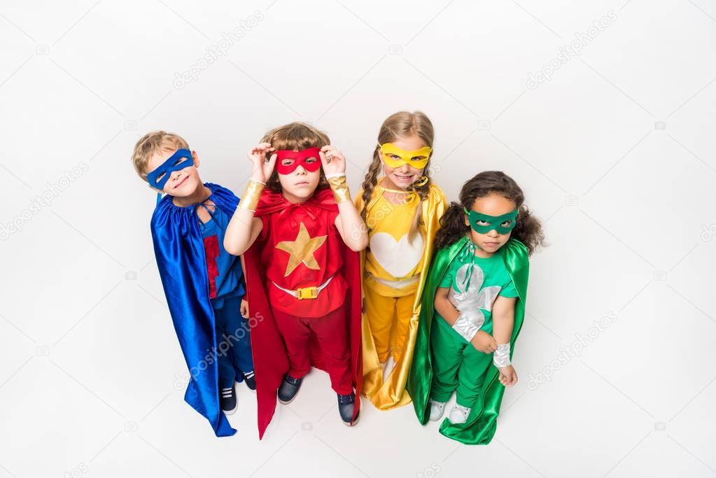 kids in superhero costumes