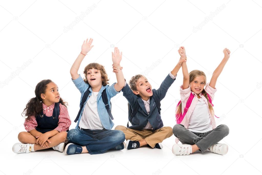 excited multiethnic schoolchildren