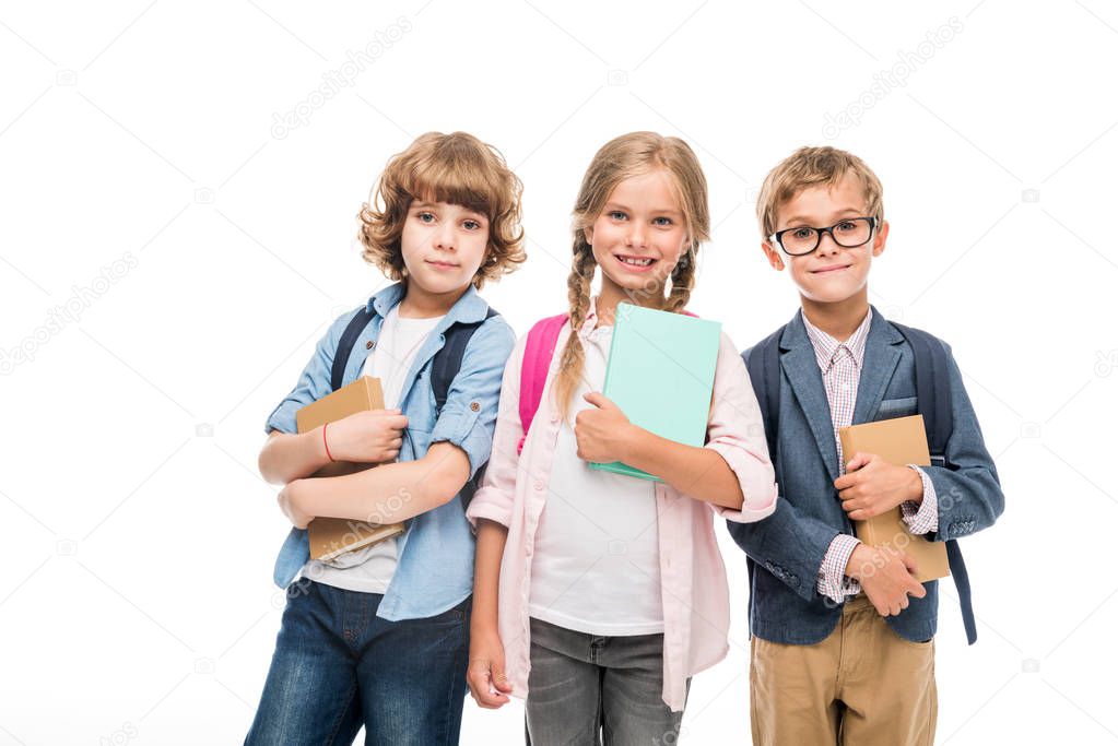 schoolchildren with backpacks and books