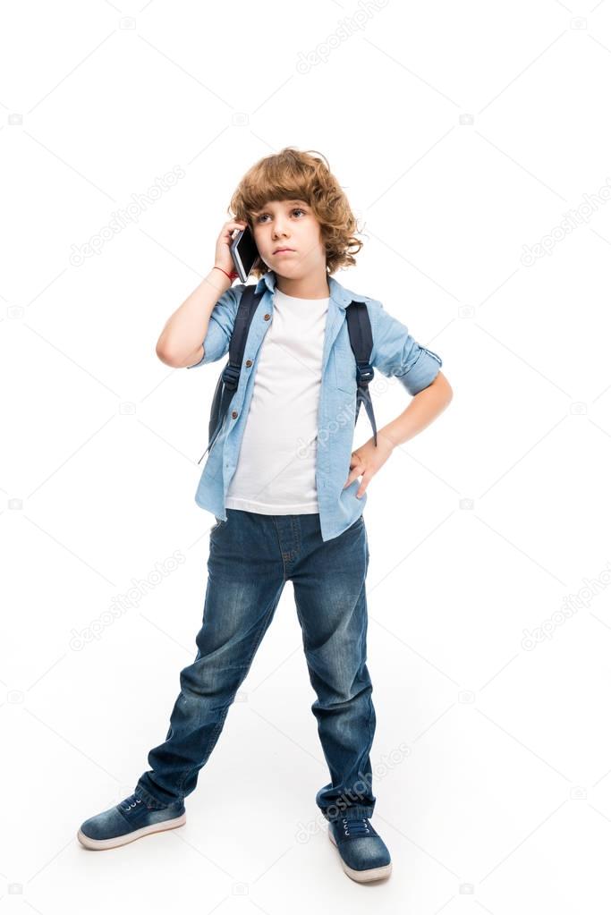 schoolboy talking on smartphone