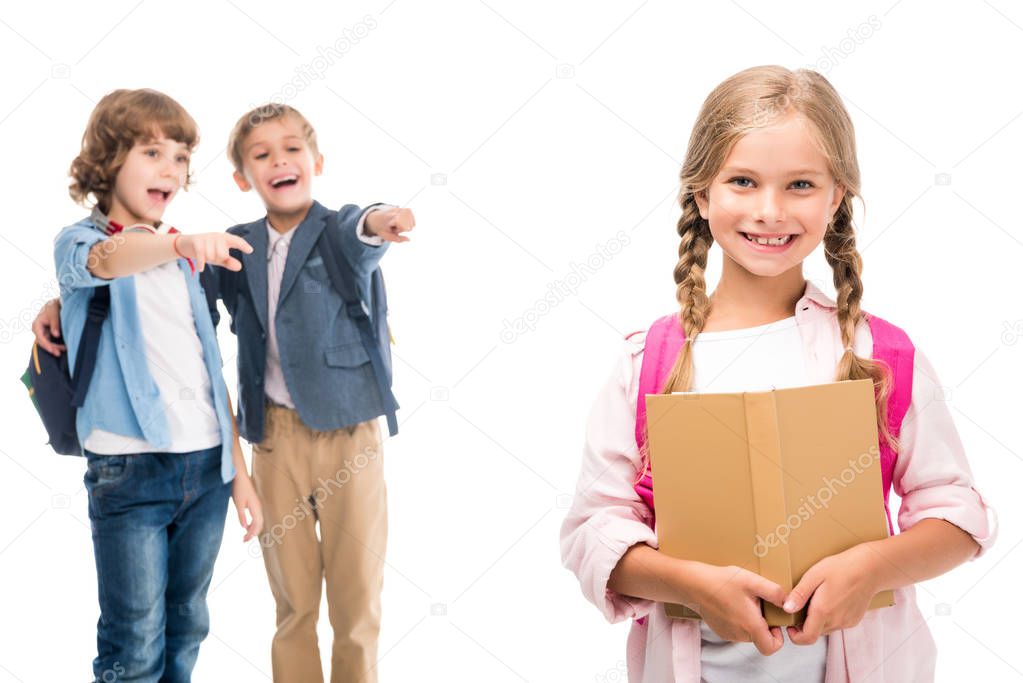 pupils laughing at schoolgirl