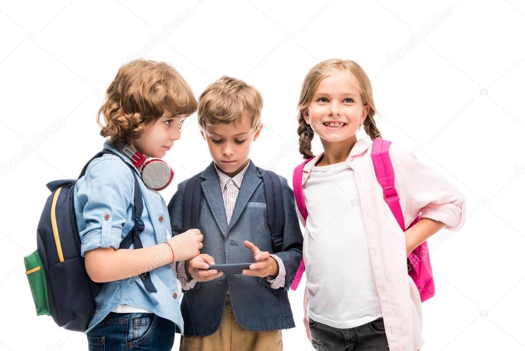 schoolchildren using smartphone