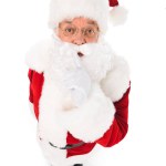 Santa claus gesturing for silence