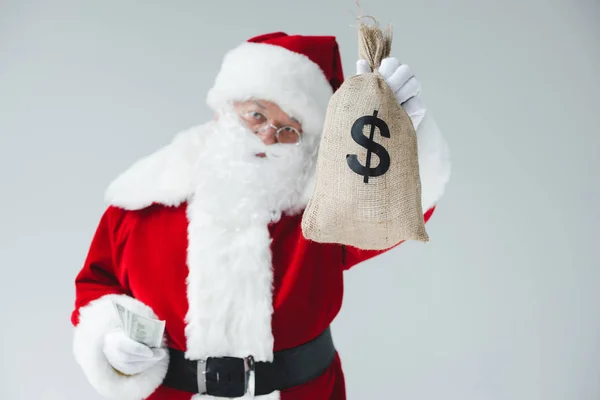 Santa with dollar banknotes — Stock Photo, Image