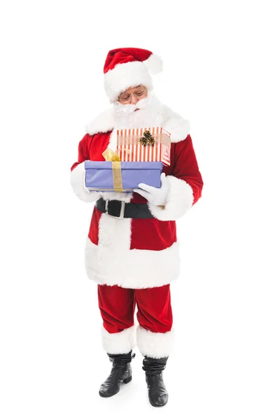 Santa claus with gift boxes — Free Stock Photo
