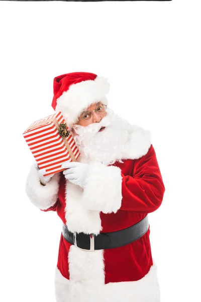 Santa claus with gift box — Free Stock Photo