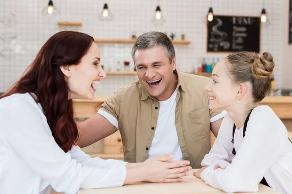 Beautiful family in cafe — Stock Photo, Image
