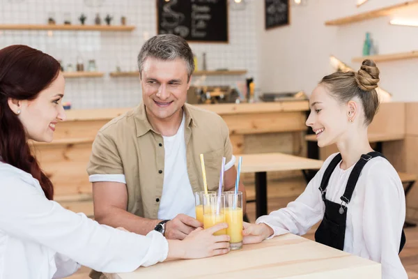 Beautiful family in cafe — Free Stock Photo