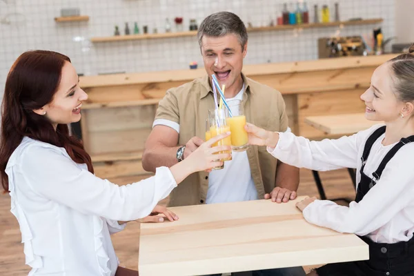 Beautiful family in cafe — Free Stock Photo