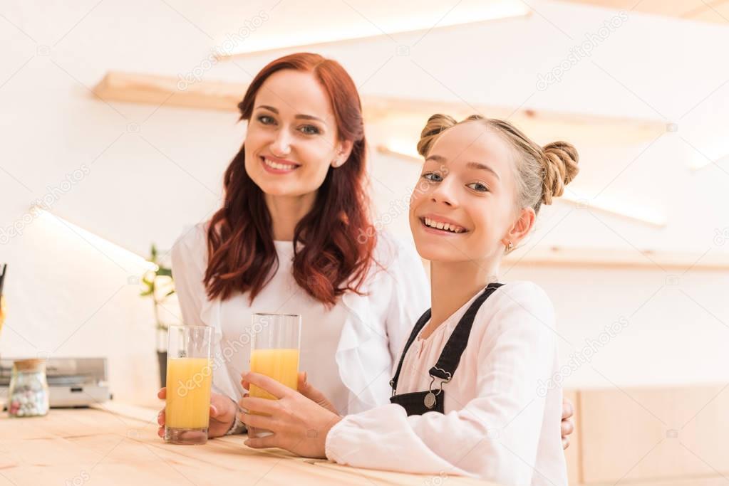 mother and daughter in cafe