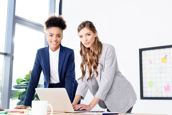 businesswomen using laptop