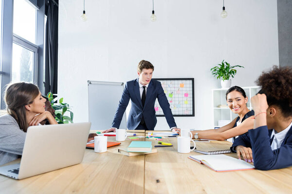 multiethnic colleagues having business meeting