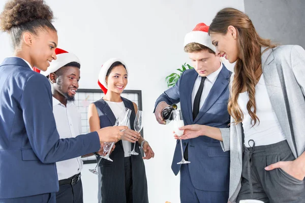 Colleagues drinking champagne in office — Stock Photo, Image