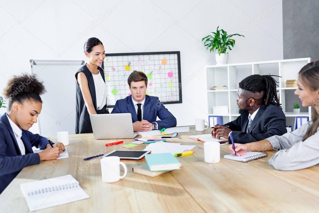 multiethnic colleagues having business meeting
