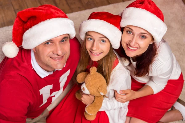 Glædelig familie fejrer jul - Stock-foto