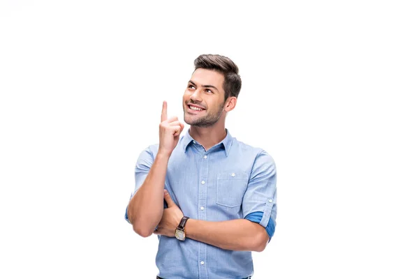 Jovem apontando para cima — Fotografia de Stock