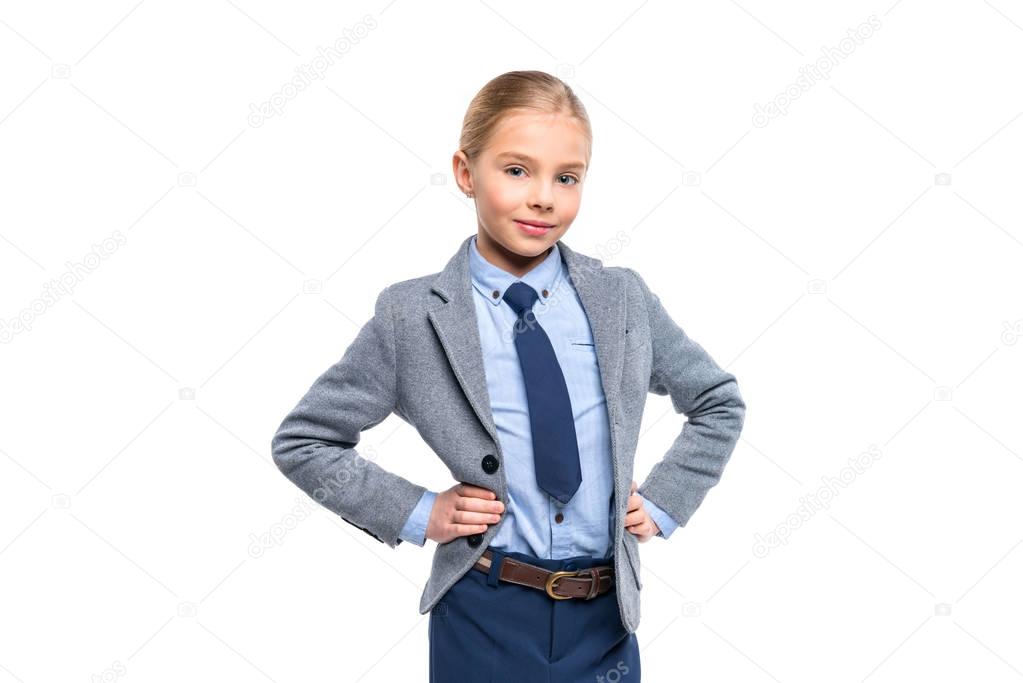 smiling schoolgirl in suit 