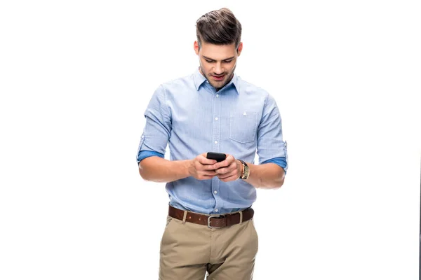 Mladý muž používající smartphone — Stock fotografie