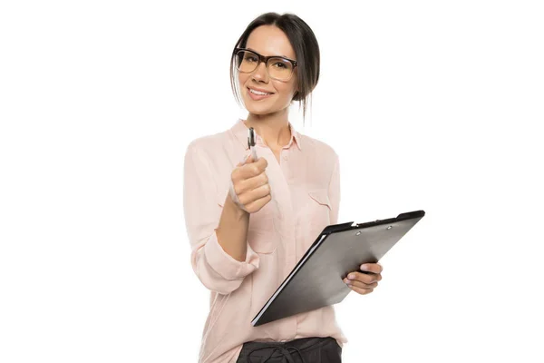 Young businesswoman with clipboard — Stock Photo, Image