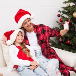 Mother and daughter taking selfie