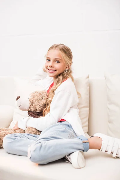 Child with teddy bear — Stock Photo, Image