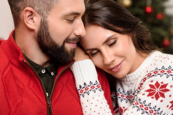 Happy couple at christmastime — Stock Photo, Image