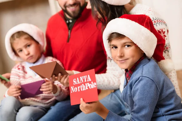 Family with letters for santa — Stock Photo, Image