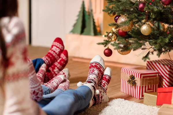 Family in knitted socks — Stock Photo, Image