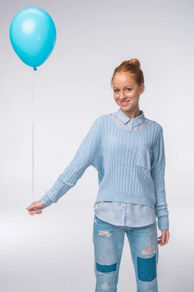 Girl in blue clothes with balloon — Stock Photo, Image