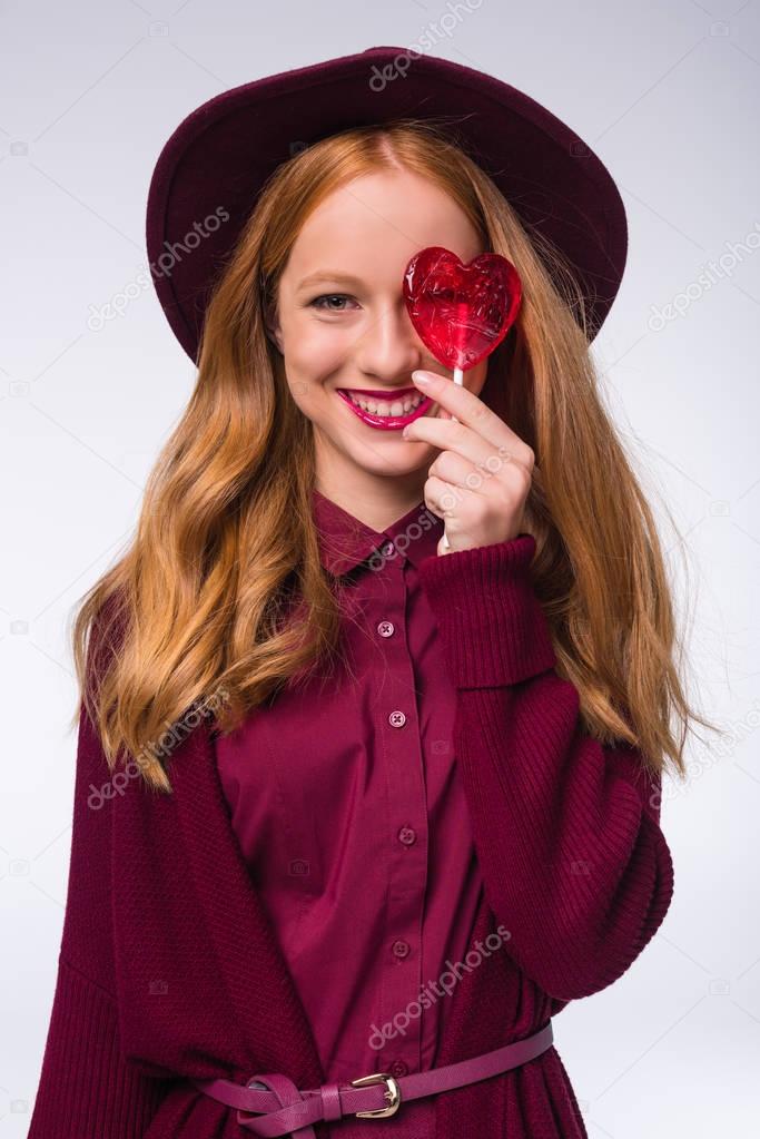 happy girl with lollipop