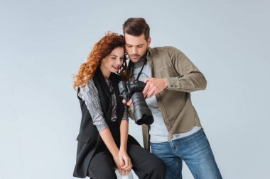 photographer and attractive model  clipart