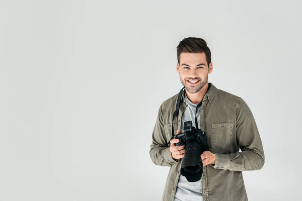 male photographer with digital camera