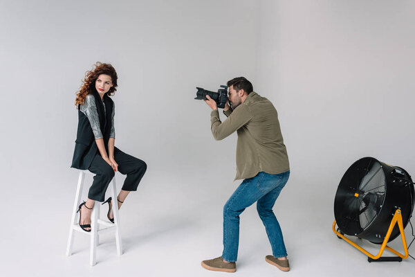 photographer and model on fashion shoot