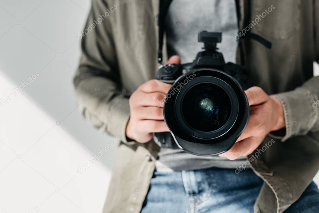 photographer with digital photo camera