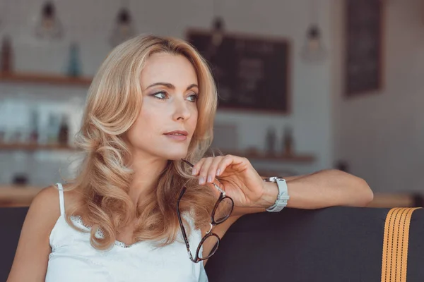 Beautiful middle aged woman with eyeglasses — Stock Photo, Image