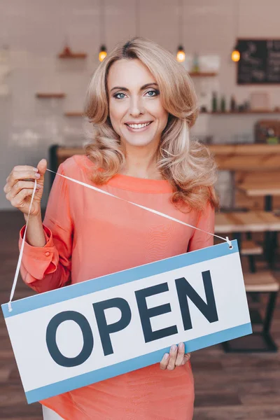 Cafe owner with sign open — Stock Photo, Image