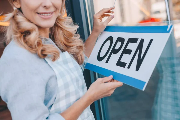 Waitress with sign open — Stock Photo, Image