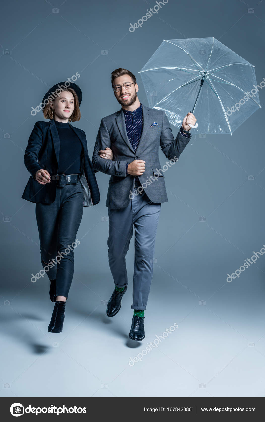Man And Woman Walking Arm In Arm Stock Photo Image By C Allaserebrina
