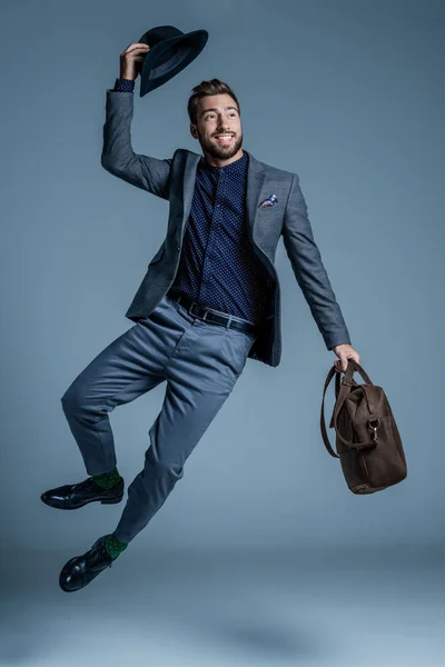 Man in suit jumping up — Stock Photo, Image