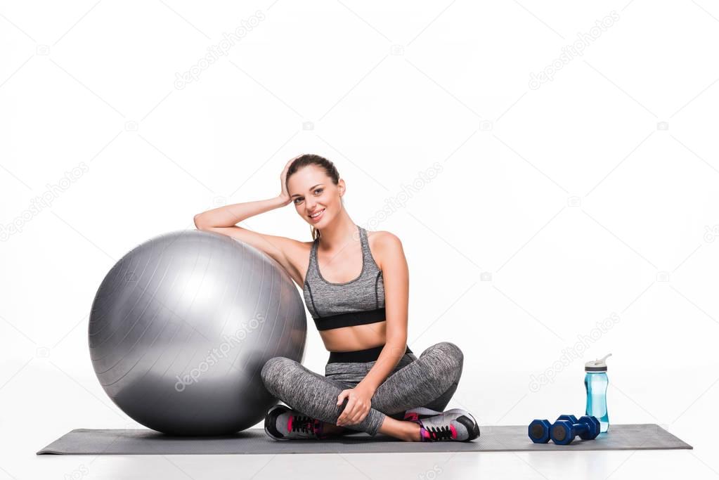 sporty girl with fitness ball