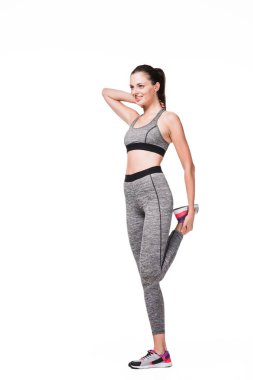 woman stretching before workout