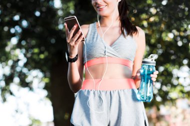 sporcumuz smartphone kullanarak kulaklık