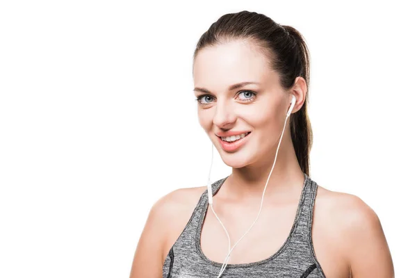 Young woman in earphones — Stock Photo, Image