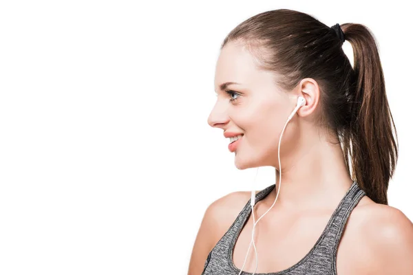 Young woman in earphones — Free Stock Photo