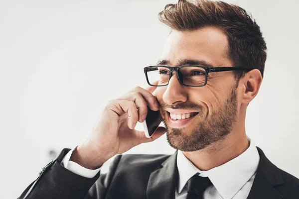 Businessman talking by phone — Stock Photo, Image