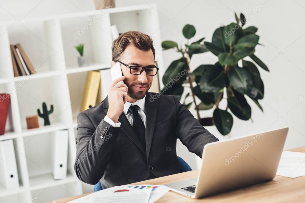 businessman talking by phone