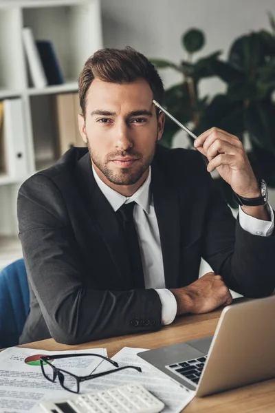 Young businessman at workplace — Stock Photo, Image