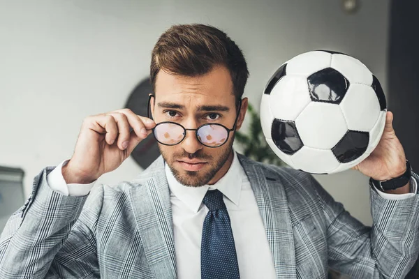 Businessman with soccer ball — Stock Photo, Image