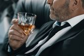 businessman with glass of whiskey