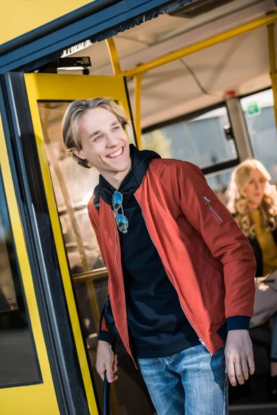 Young man in bus — Free Stock Photo